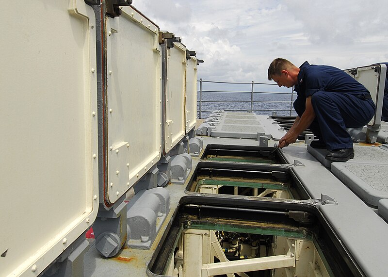 File:US Navy 080724-N-4236E-120 Gunner's Mate 1st Class Robert Lambert performs maintenance on the missile deck.jpg