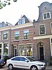 Diep huis van twee bouwlagen met achterhuis