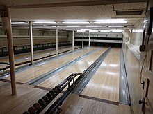 The basement of the Woodfords Club includes a five lane bowling alley for club members. WoodfordsClubBowling.jpg