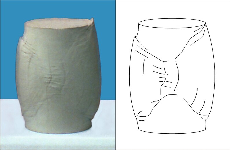 File:X-shaped shear bands in clay.jpg