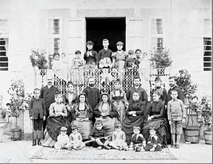 Pontic Greek family in the courtyard of a Trapezounta house (modern Trabzon, Turkey)