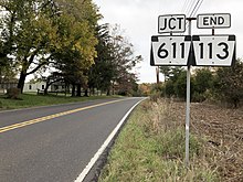PA 113 approaching its northern terminus at PA 611 in Tinicum Township 2022-10-25 15 05 58 View north along Pennsylvania State Route 113 (Bedminster Road) just south of Pennsylvania State Route 611 (Easton Road) in Tinicum Township, Bucks County, Pennsylvania.jpg