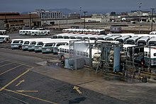 Mixed "old-look" and New Look buses from GM at the Seminary Division bus wash ACT161 (11177781405).jpg