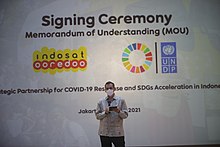 Al-Neama delivers keynote speech in 2021 at Indosat Ooredoo X UNDP Signing Ceremony