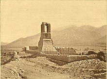 This church, during the revolt of 1847, was turned into a fortification, and held by Mexicans and Puebloans while being stormed during the Taos Revolt by the United States troops, who marched from Santa Fe to Taos when the news of the murder of Governor Charles Bent reached the Capital. Among the Pueblo Indians (1895) (14596291898).jpg