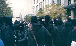 Black bloc organizing during WTO protests Anarchists at WTO protest (14988709689).jpg