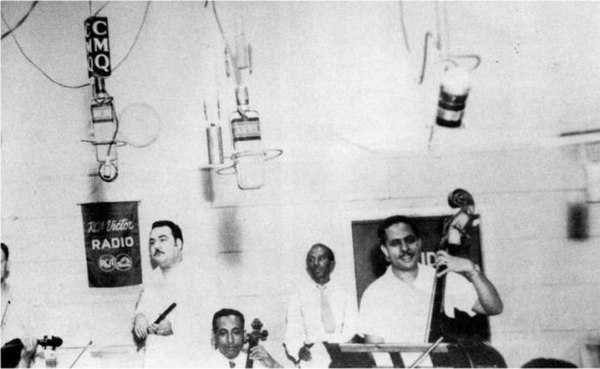 Arcaño y sus Maravillas at Radio CMQ, c. 1945: Arcaño on flute, Orestes López on cello, Cachao on bass (right)