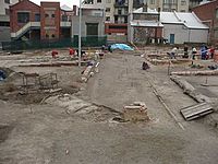 Archaeologists at work amongst building footings at Little Lon, in 2002. Arch site 2002.jpg