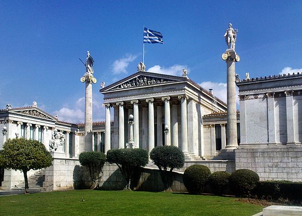 The modern National Academy in Athens, with Apollo and Athena on their columns, and Socrates and Plato seated in front.