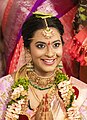 Bride offering her respects to God through a traditional gesture known as Namaskaram (02)