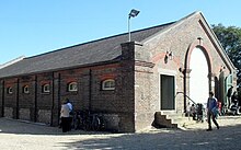 This coal storage shed was added to the complex in 1875. British Engineerium (former Coal Shed), The Droveway, Hove (IoE Code 365680).jpg