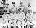 Captain Arleigh A. Burke, Commander Destroyer Squadron 23 with other officers of the squadron, during operations in the Solomon Islands, circa 1943.