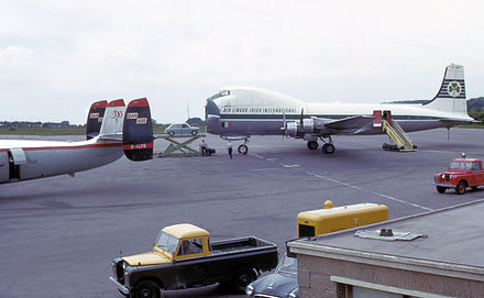 An Aviation Traders Carvair that was used as a vehicle freighter is seen loading a car at Bristol Airport in 1964.