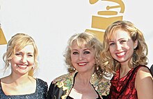 Reeder with daughters Cimcie and Ashlee Nichols at the 54th Grammy Awards in 2012 to accept her husband's Special Merit/Technical Grammy Award. Cimcie, Connie & Ashlee Nichols Grammys 2012.jpg