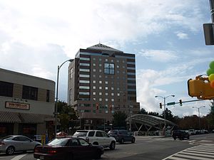 Intersection of Wilson Boulevard and N. Highland Street in Clarendon, with Clarendon Metro Station entrance and Olmsted Building in background (2008) Clarendon, Arlington, VA 017 (2907989443).jpg