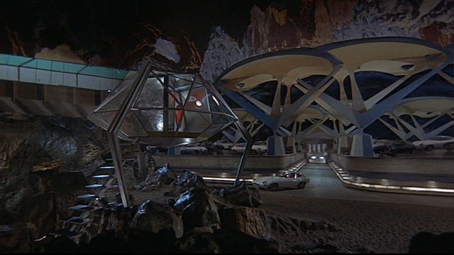 An example of Bava's visual effects work on the film: most of the background scenery behind Diabolik's white Jaguar E-Type is represented by a glass m