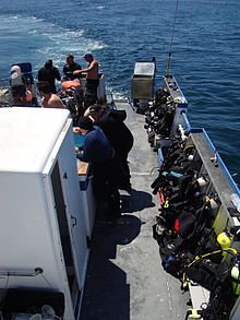 Divers on the deck of a day dive boat Dive Boat divers.jpg