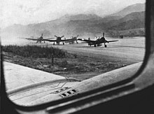 F6F-5N Hellcats of Marine Night Fighting Squadron 541 (VMF(N)-541) take off from Peleliu, in 1944.