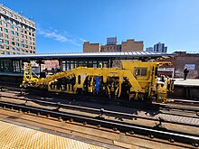 Plasser American Tamping Machine in Harlem, New York. GRM3000T Tamping Machine.jpg