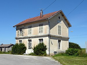 Two-story building with gabled roof