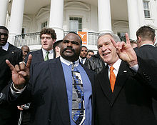 Madden gives the Hook 'em Horns with George W. Bush. George W. Bush and Jeff Mad Dog Madden.jpg