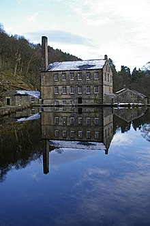 A small water-powered cotton mill and its power source Gibson Mill.jpg