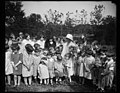 Grace Coolidge and group of children outdoors LCCN2016888067.jpg
