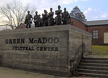 These life-size bronze statues of the twelve black students who integrated Clinton High School in 1956 stand outside the former Green McAdoo School in Clinton. Green-McAdoo-ClintonTN-enhanced.jpg