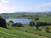 Hüttnersee and Zimmerberg plateau as seen to the northwest, Lake Zürich and Pfannenstiel in the background