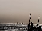 Kalastajia merellä Norsunluurannikolla harmattanin aikana muutaman kilometrin päässä rannikosta.