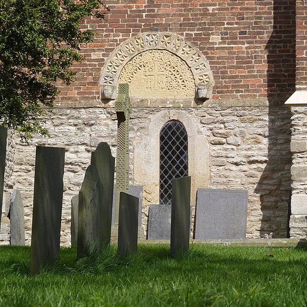 File:Hawksworth, gravestones and tympanum - geograph.org.uk - 3933362.jpg