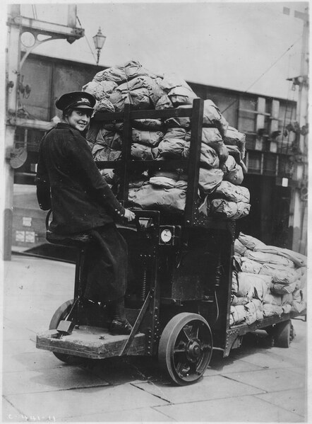 File:Historical. Women's work, railway workers. Railsdok Parcel Truck workers. Operating railway parcel transfer. Girl... - NARA - 522866.tif