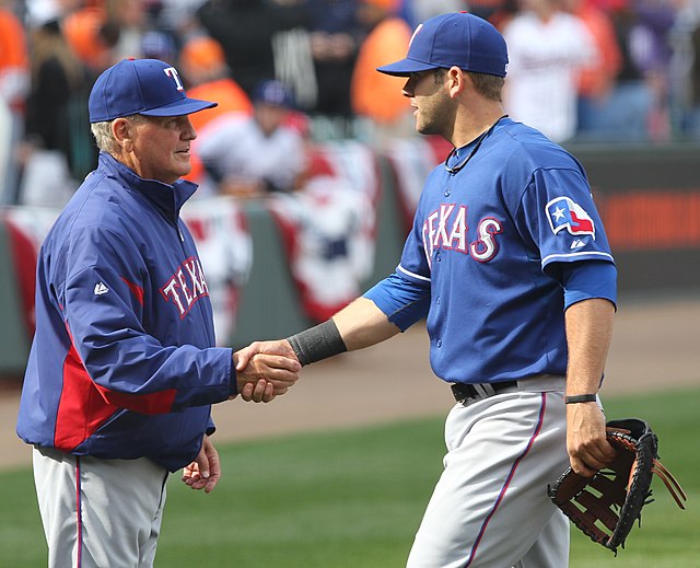 Moore (left) with the Texas Rangers in 2011