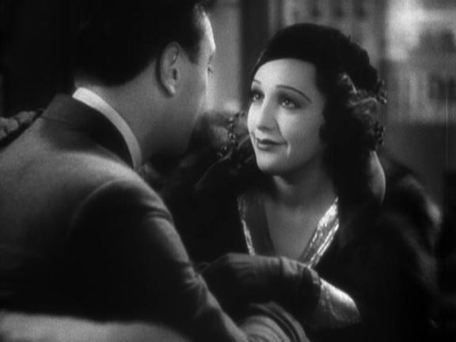 Pat Denning (George Brent) and his old vaudeville partner Dorothy Brock (Bebe Daniels).