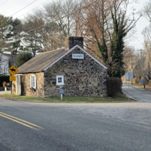 Building at the junction of Goshen and Providence Roads in Willistown Township designed by R. Brognard and his son, Charles. Junction of Goshen and Providence Roads.png