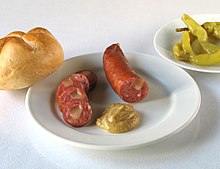 A Kasekrainer sausage with a Kaiser roll and mustard Kasekrainer.jpg