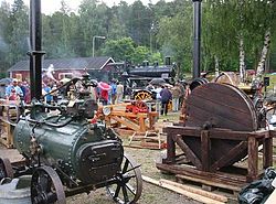 A Live Steam Festival displaying equipment ranging from small stationary engines to full-size locomotives. Porvoo, Finland, 2003 Lsfestival.jpg