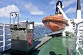 MF Stetind (1977) car ferry (bilferge) Ship's deck (skipsdekk) Rescue life boat (redningsbåt) Davit controller power accumulator for emergency hoisting of rescue boat etc. Vannsundet Karlsøy kommune Troms Norway 2019-05-06 7809.jpg