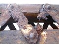 Rusted struts of the 70-year-old Nandu River Iron Bridge