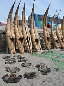 Totora reed fishing boats on the beach at Huanchaco, Peru Peruvian fishing boats.jpg