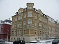 Apartment house in closed development in a corner