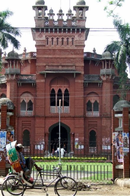 A cycle rickshaw in front of Curzon Hall, Dhaka University