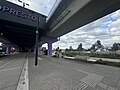 The southerb forecourt, landscaping and pink station entrance signage, August 2024