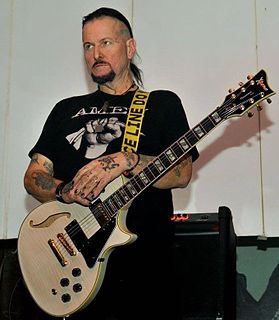 Rikk Agnew guitarist