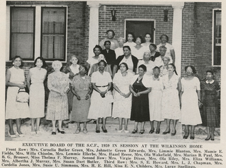 The Executive Board of the South Carolina Federation of Colored Women's Clubs in front of the Wilkinson Home in 1959. SCFCWC executive board.png