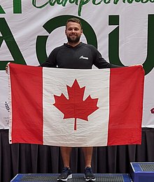 Samuel Murray on the podium at the 2022 IRF World Championships