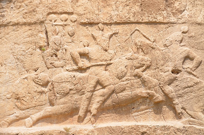 File:Sasanian relief commemorating an equestrian victory by king Bahram II (r. AD 276-293), Naqsh-e Rostam, Iran (48098755203).jpg