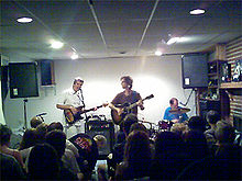 Semisonic performing in a 2006 basement concert. L-R: Munson, Wilson, and Slichter Semisonic.jpg