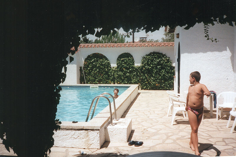 File:Speedo boy by the pool.jpg