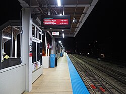 Temporary southbound platform at Bryn Mawr looking north, immediately after opening (51181889456).jpg